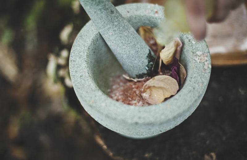 Traditional herbal preparation with mortar and pestle